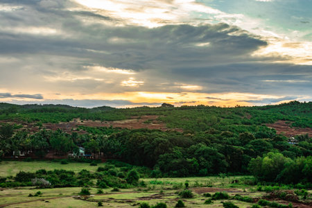 mountain top view of hill range with clouded sky at evening image is taken at gokarna karnataka...
