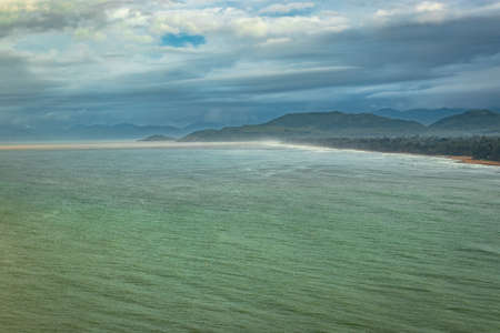 sea shore horizon view from mountain top at morning image is taken at gokarna karnataka india. it is showing the pristine beauty of gokarna beach.の写真素材