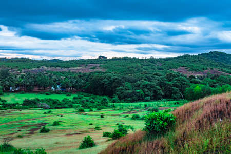 mountain top view of hill range with clouded sky at evening image is taken at gokarna karnataka india.の写真素材
