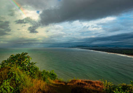 sea shore horizon view from mountain top at morning image is taken at gokarna karnataka india. it is showing the pristine beauty of gokarna beach.の写真素材