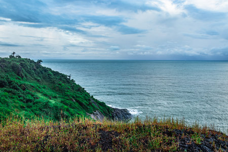 sea horizon view with dramatic cloud from mountain top image is taken at gokarna karnataka india. it...
