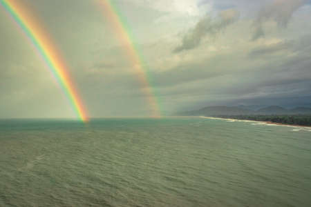rainbow colorful above sea horizon at dawn image is taken at gokarna karnataka india. it is showing the colorful art of nature.の写真素材