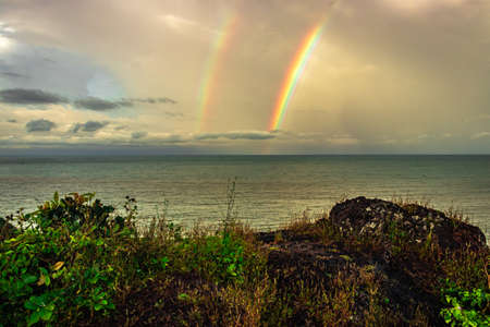 rainbow colorful above sea horizon at dawn image is taken at gokarna karnataka india. it is showing the colorful art of nature.の写真素材