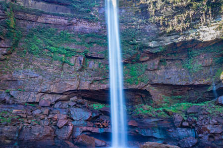 waterfall falling streams from mountain top with reflection from different perspective image taken on phe phe fall meghalaya india. it is one of the tallest waterfall of meghalaya.の写真素材