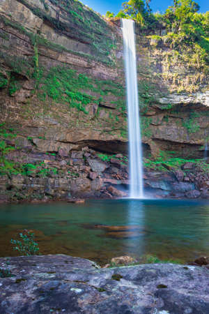 waterfall falling streams from mountain top with reflection from different perspective image taken on phe phe fall meghalaya india. it is one of the tallest waterfall of meghalaya.の写真素材