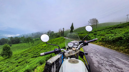 motorcycle ridding in isolated beautiful mountain at morning from flat angle image is taken at mirik...