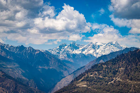 himalaya mountain valley with bright blue sky at day from hilltop image is taken at tawang arunachal pradesh india.の写真素材