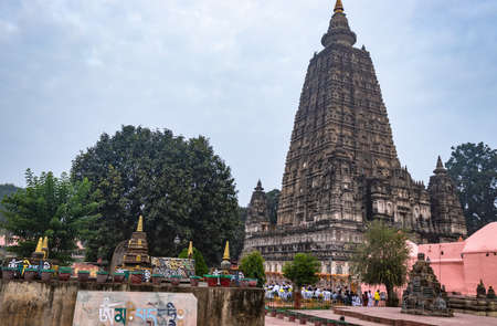 Buddhist monks are praying at temple at morning with concentration image is taken at mahabodhi temple bodh gaya bihar india on 15 Mar 2020. it is the enlightened place of Grate budha.のeditorial素材