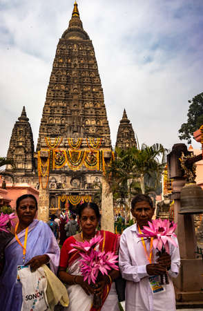 Buddhist monks are praying at temple at morning with concentration image is taken at mahabodhi temple bodh gaya bihar india on 15 Mar 2020. it is the enlightened place of Grate budha.のeditorial素材