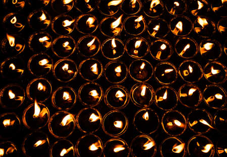 traditional religious oil lamp many lightened for almighty godの写真素材