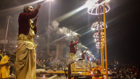 Evening praying and devotion for the mother ganga river and the nature image is taken at dasaswamedh ghat varanasi india on Jan 14 2019. It is the glimpse of evening ganga aarti showing the devotion.のeditorial素材