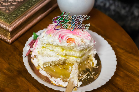 sliced birthday pineapple cake from different angle