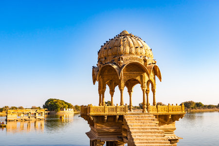 heritage architecture at lake with bright blue sky from different angle at dayの写真素材