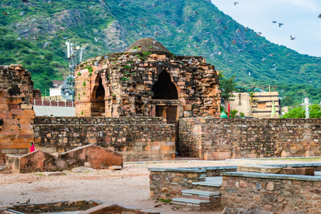 ancient grand mosque called Adhai Din Ka Jhonpra vintage architecture with bright blue sky at day from different angle image is taken at Adhai Din Ka Jhonpra at ajmer rajasthan india on Aug 19 2023.の写真素材