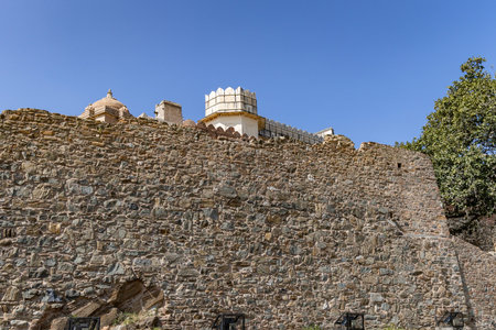 isolated ancient fort stone wall with bright blue sky at morning image is taken at Kumbhal fort kumbhalgarh rajasthan india.の写真素材
