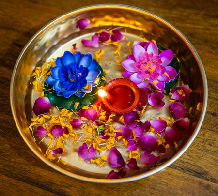 decorated flowers kept in copper plat at festival at home form top angle