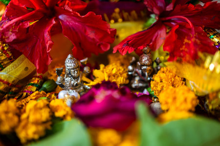 holy hindu god worship with flowers at durga pooja festival at night from different angle
