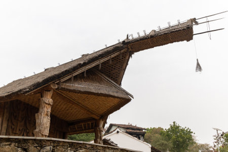 artistic rural tribe traditional home made of bamboo twigs and mud at village at dayの写真素材