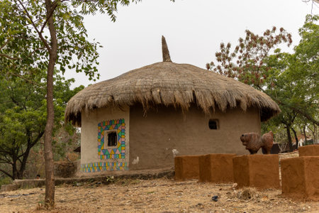 rural tribe traditional home made of twigs and mud at village at dayの写真素材