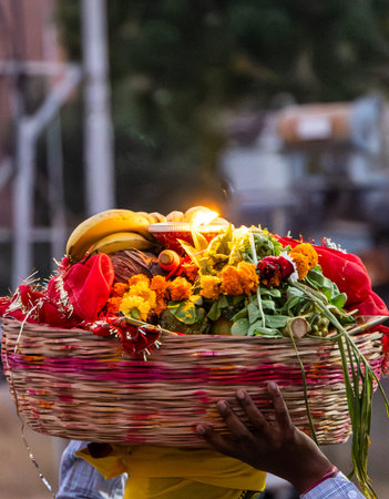 holy offerings of burning clay oil lamp for hindu sun god at chhath festivalの写真素材