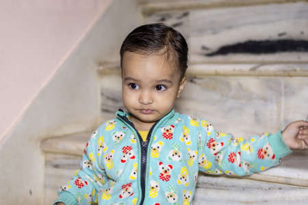 smiling kid innocent facial expression at indoor at night