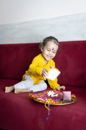 baby boy cute expression on the occasion of hindu raksha bandhan festival at indoor