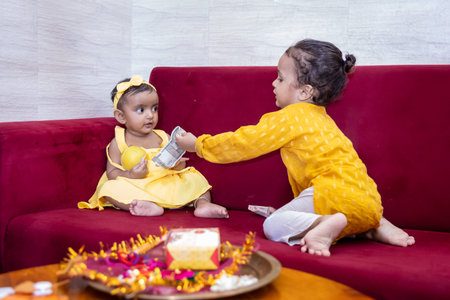 brother and sister cute expression on the occasion of hindu raksha bandhan festival at indoor