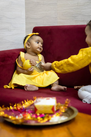 brother and sister cute expression on the occasion of hindu raksha bandhan festival at indoor