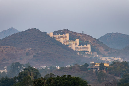 historical palace architecture at misty mountain top at morning image is taken at udaipur rajasthan india.の写真素材