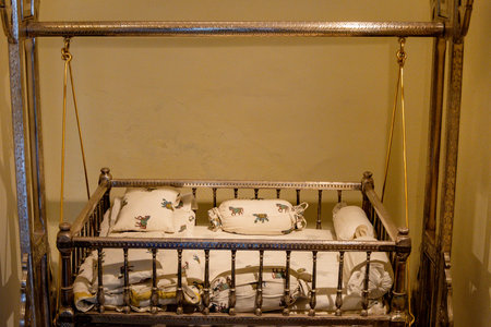 silver cradle for royal family at indoorの写真素材