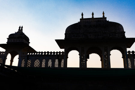 backlit shot of palace exterior with bright blue sky at morning image is taken at city palace, Udaipur rajasthan india.の写真素材