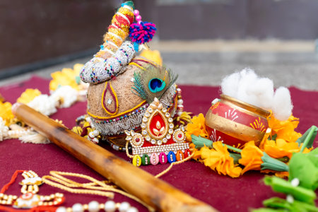 hindu god krishna holy peacock feather and flute indoor shot from different angleの写真素材