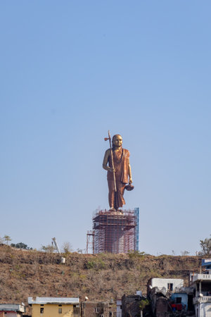 hindu spiritual guru adi shankaracharya statue at mountain top at morning image is taken at omkareshwar khandwa madhya pradesh india.の写真素材