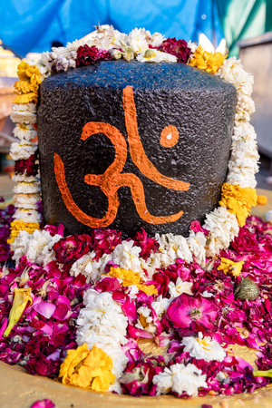 idol of hindu holy god shivalinga at temple from flat angle