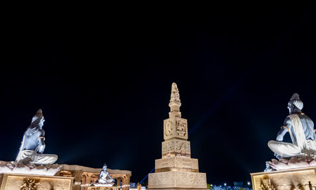 idol of hindu holy sage sitting in mediation at outdoor at night image is taken at mahakaleshwar mahakal temple corridor ujjain madhya pradesh india.の写真素材