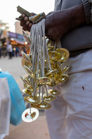indian hand kartal with thread at street for sell at dayの写真素材