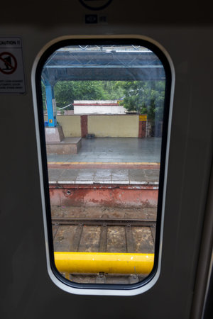 Passenger Train Door Window View During Daytime image is taken of vande bharat or indian railway...
