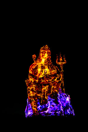 Lord Shiva as destroyer Kaal Bhairava the fierce form with dramatic laser light effectの写真素材