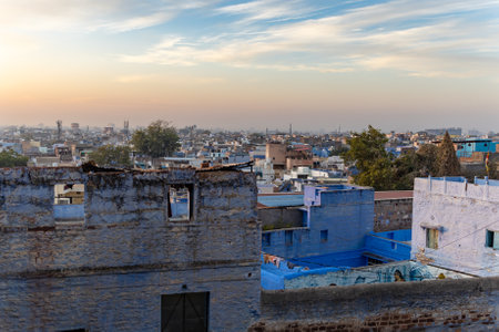 crowded city house with morning bright dramatic sky image is taken jodhpur rajasthan india.の写真素材