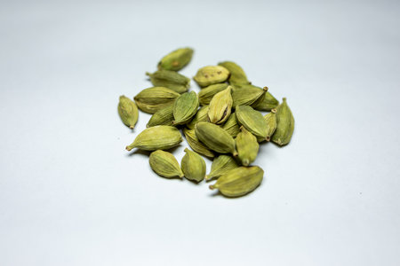 fresh isolated cardamom close up on white background studio shotの写真素材