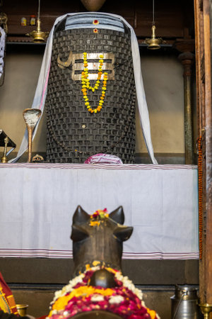 isolated huge shivlinga with tripund at holy temple at indoorの写真素材
