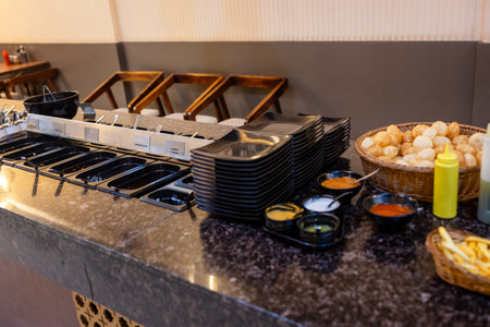 unlimited buffet counter with many items kept for self service at indoorの写真素材