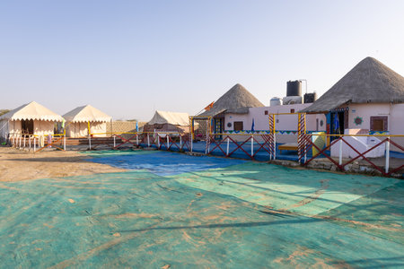 desert camp setup in natural surroundings with bright skyの写真素材