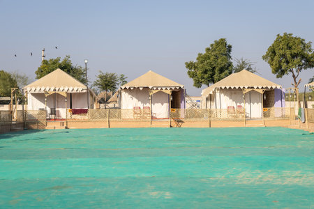 desert camp setup in natural surroundings with bright skyの写真素材