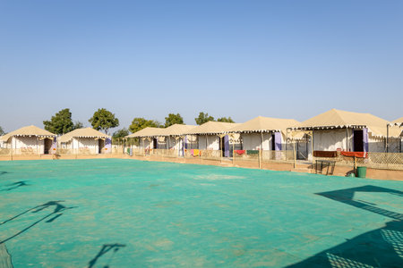 desert camp setup in natural surroundings with bright skyの写真素材