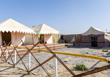 desert camp setup in natural surroundings with bright skyの写真素材