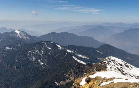 mountain range with bright blue sky at morning image is taken at chandrashila trek tungnath chopta uttarakhand india.の写真素材