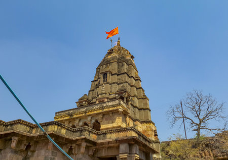 holy hindu temple architecture with bright blue sky at dayの写真素材