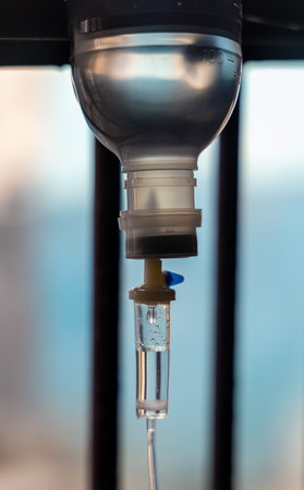 hospital iv line with droplets under natural lightの写真素材