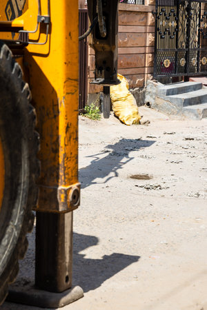 roadwork in progress with digger at construction site